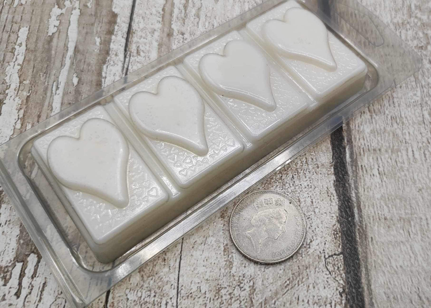 Orange and coconut, coconut wax melt.