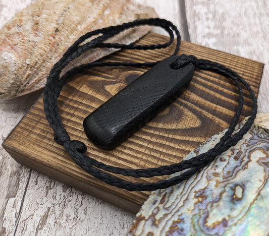 Bog oak hand carved Hei Toki adze unisex pendant.