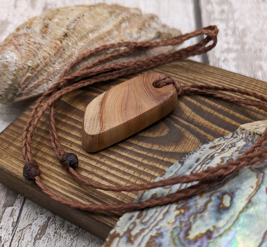 Yew wood free form slice, pendant.