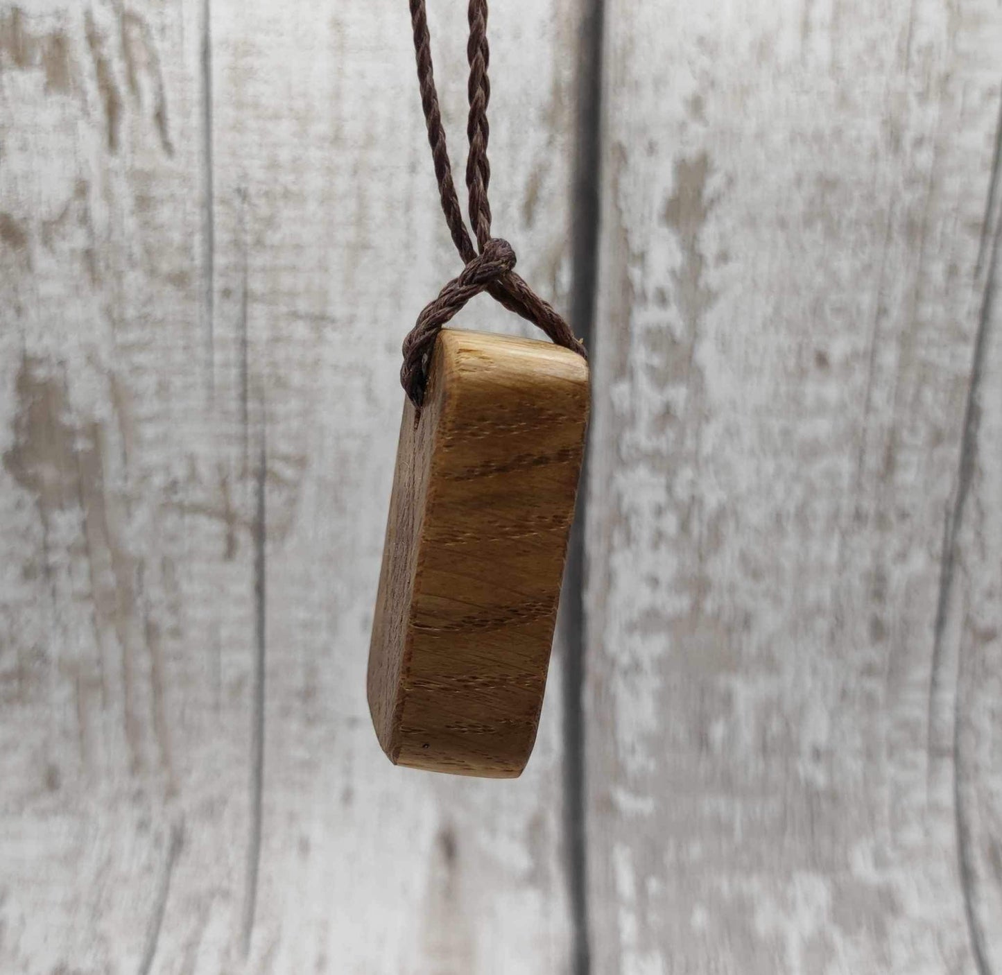 Oak wood gebo rune Christmas decoration with Pāua shell.