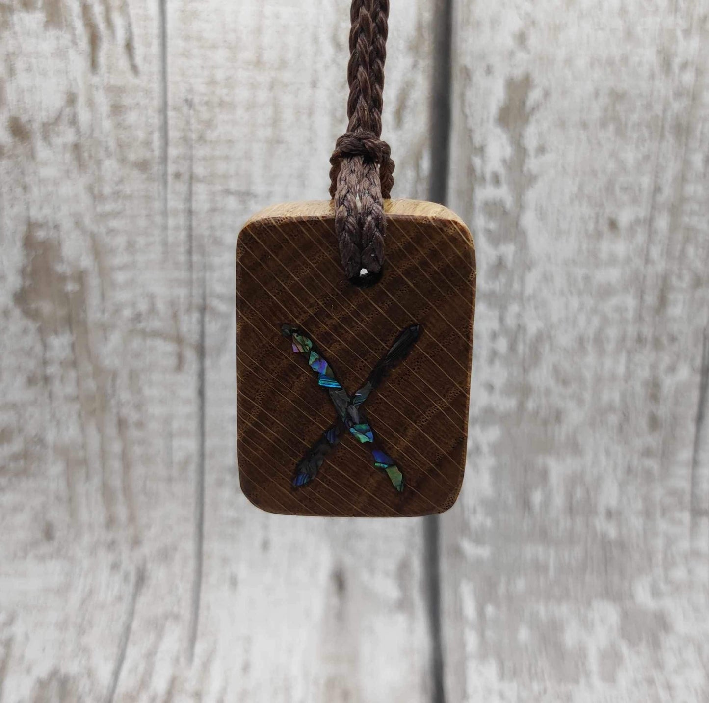Oak wood gebo rune Christmas decoration with Pāua shell.