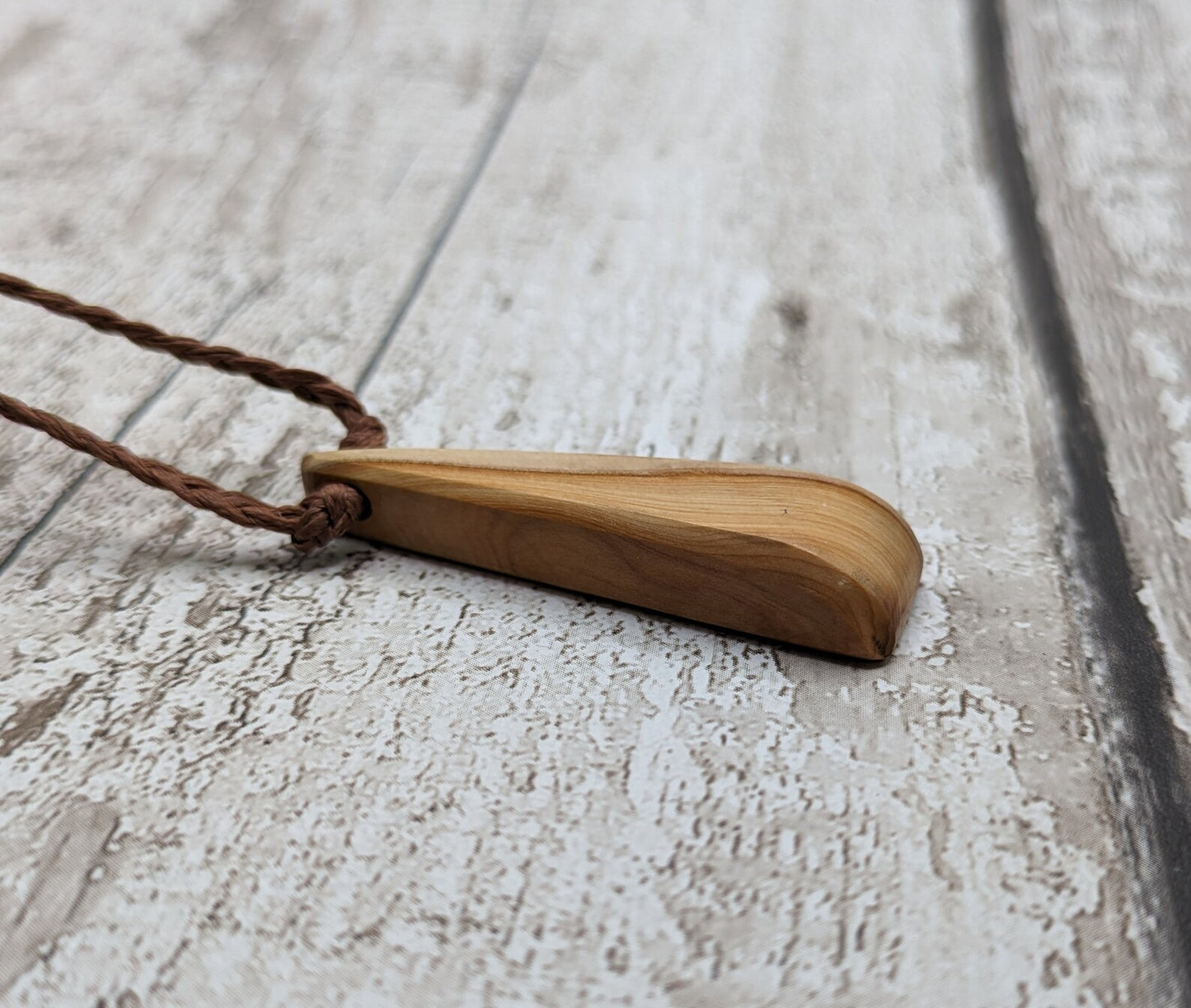 Yew wood Toki styled pendant.