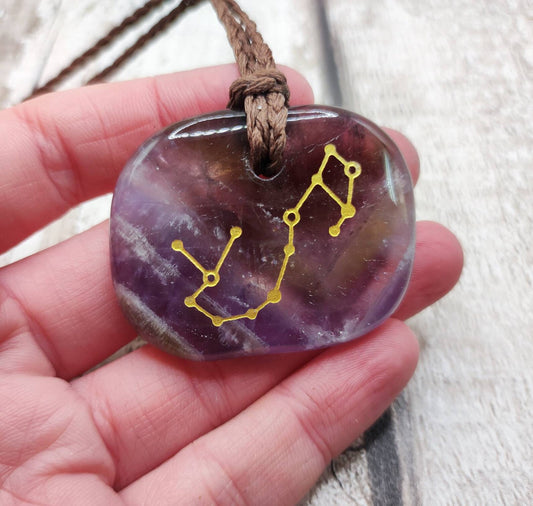 Amethyst star sign astrology, Pisces palm stone pendant.