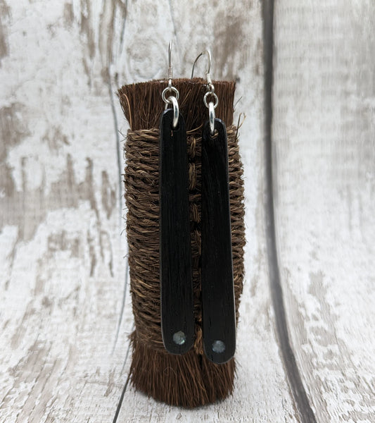 Fenland bog oak roimata drop earrings with mussel shell inlay.