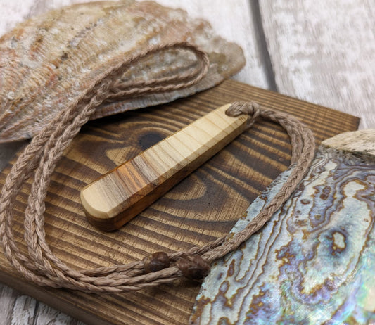 Yew wood roimata teardrop pendant.