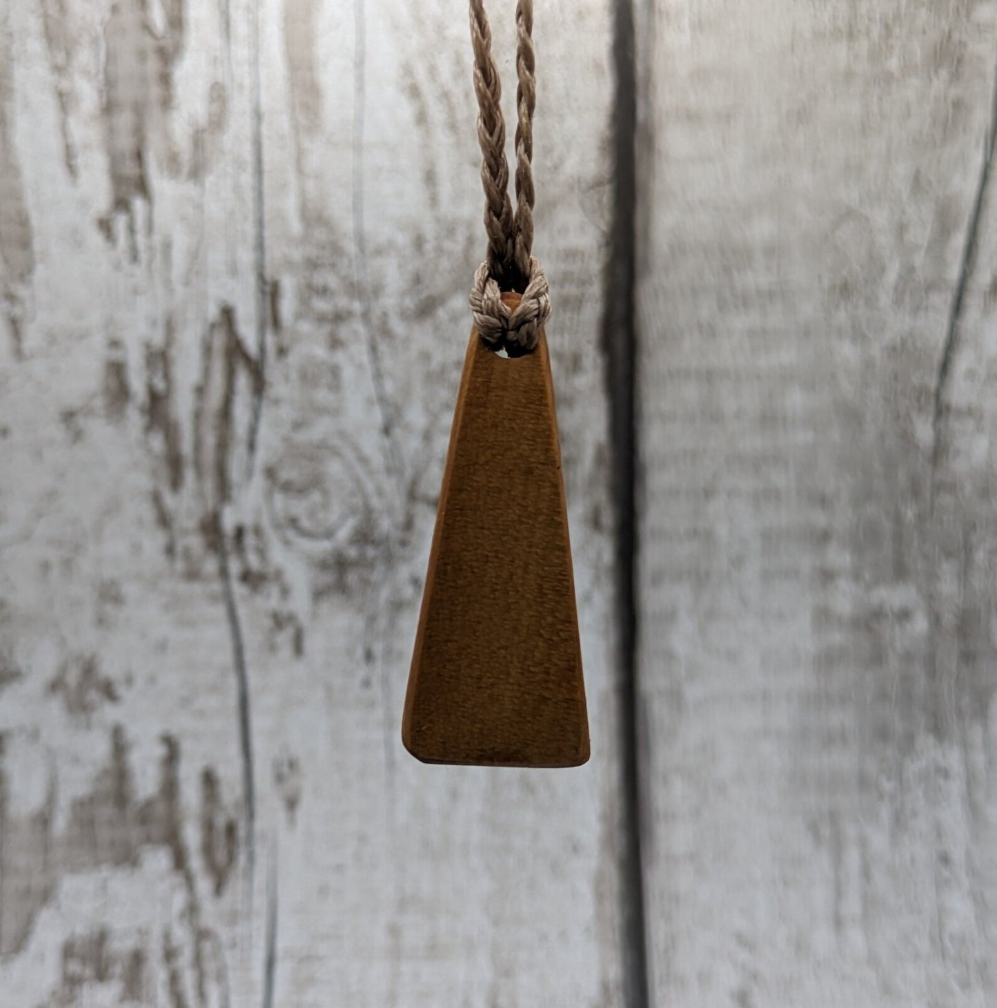 New Zealand Rimu wood Toki styled pendant.