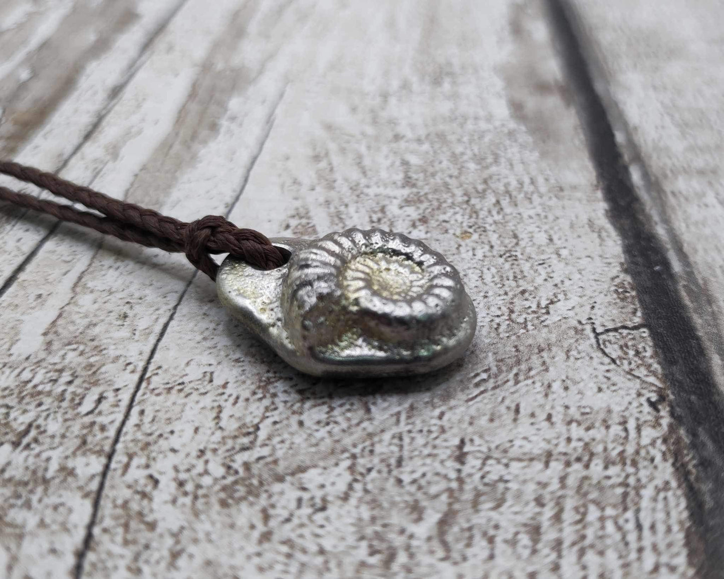 Pewter solid cast ammonite pendant.