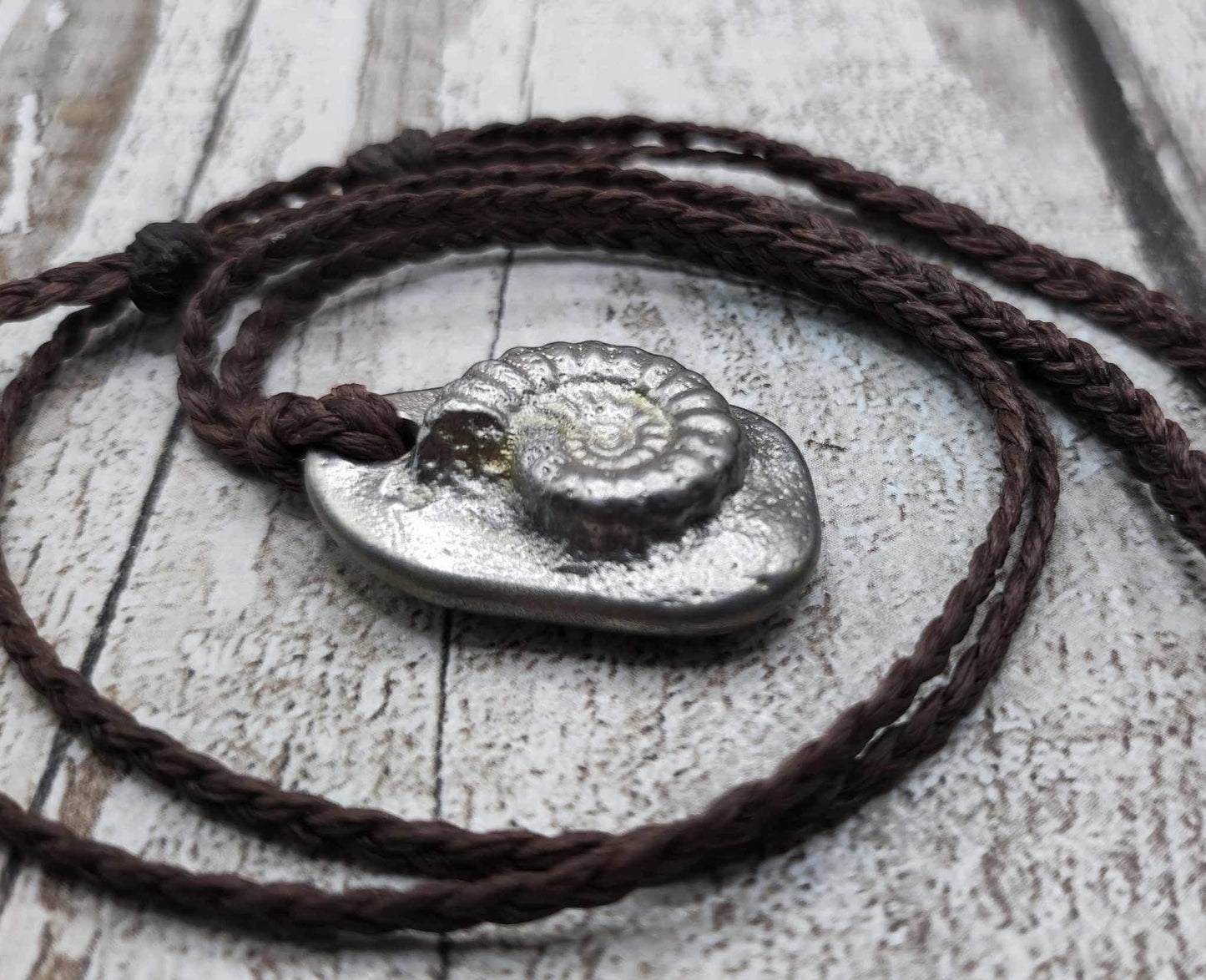 Pewter solid metal casting ammonite pendant.