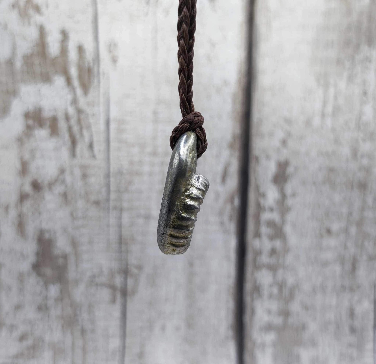 Pewter ammonite solid cast pendant.