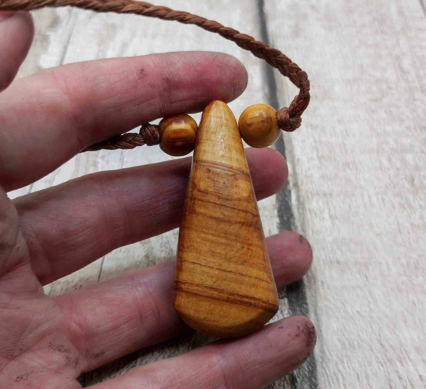 New Zealand Rimu wood and kauri copal gum pendant