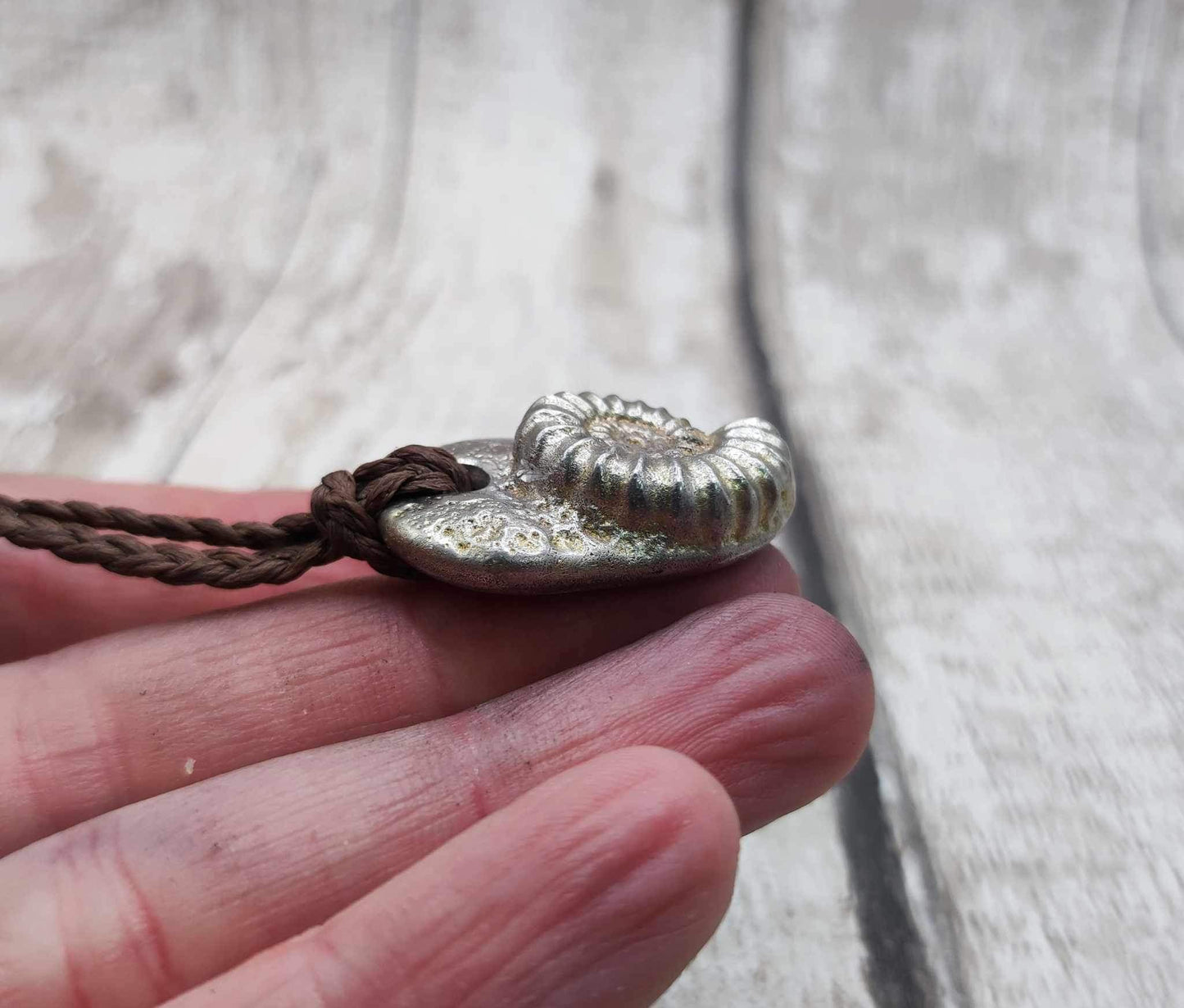 Pewter ammonite solid cast pendant.