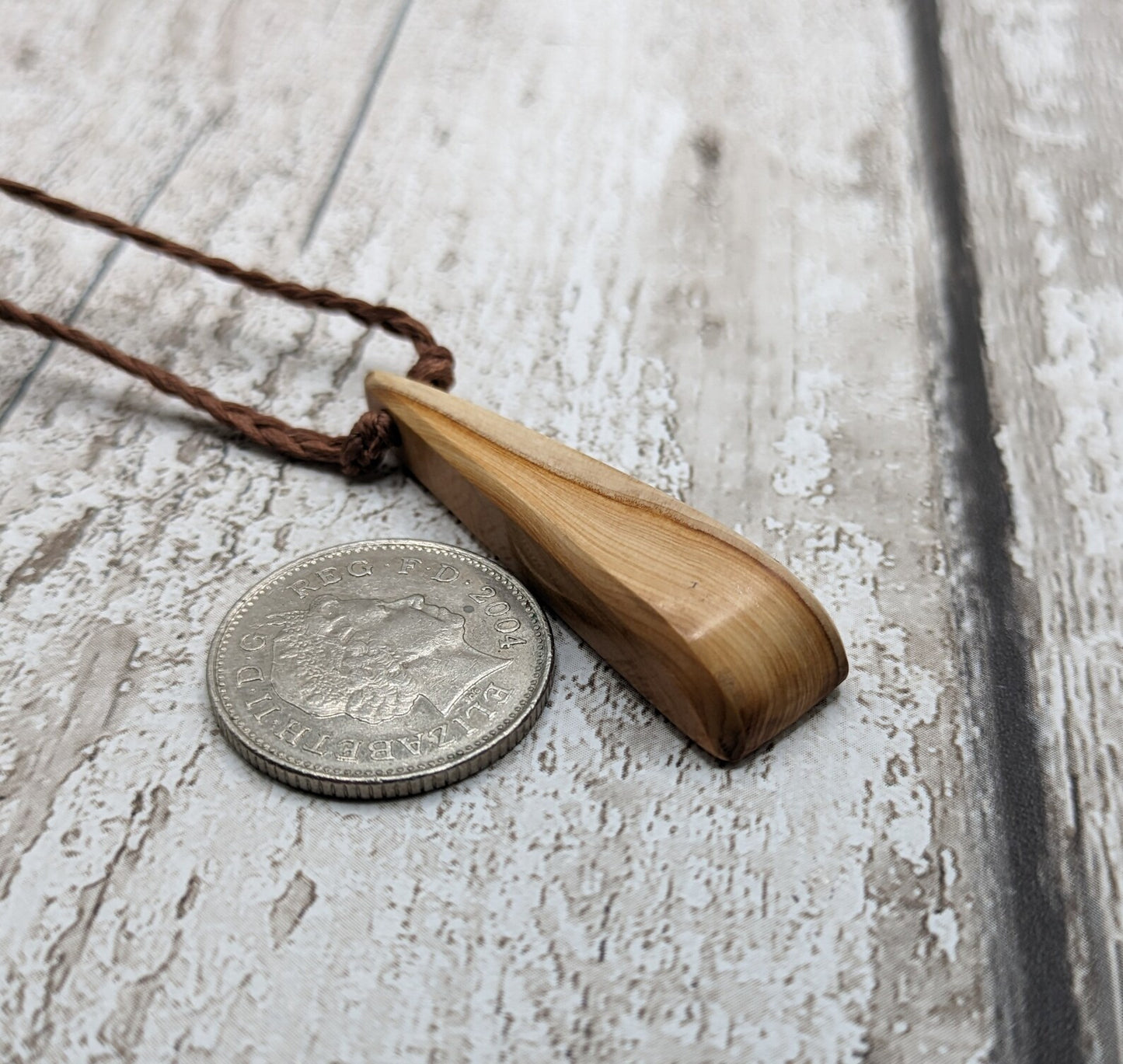 Yew wood Toki styled pendant.