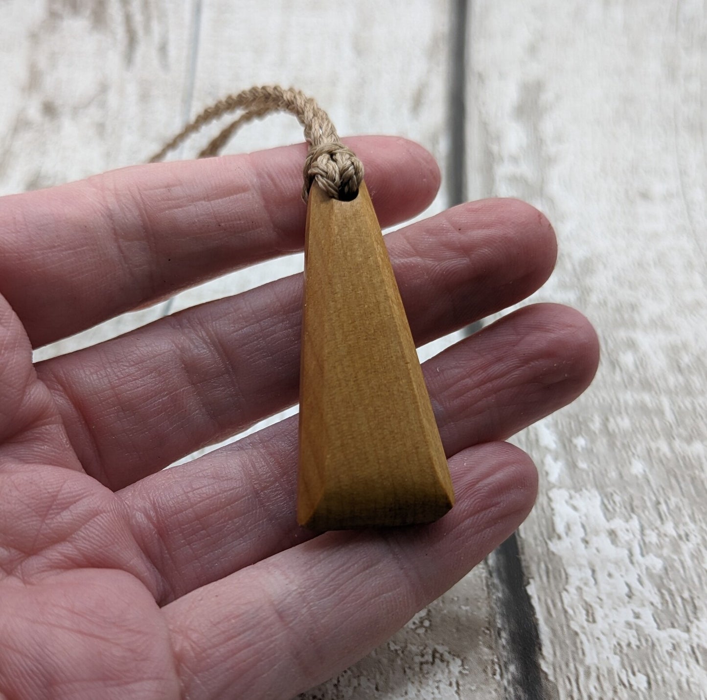 New Zealand Rimu wood Toki styled pendant.