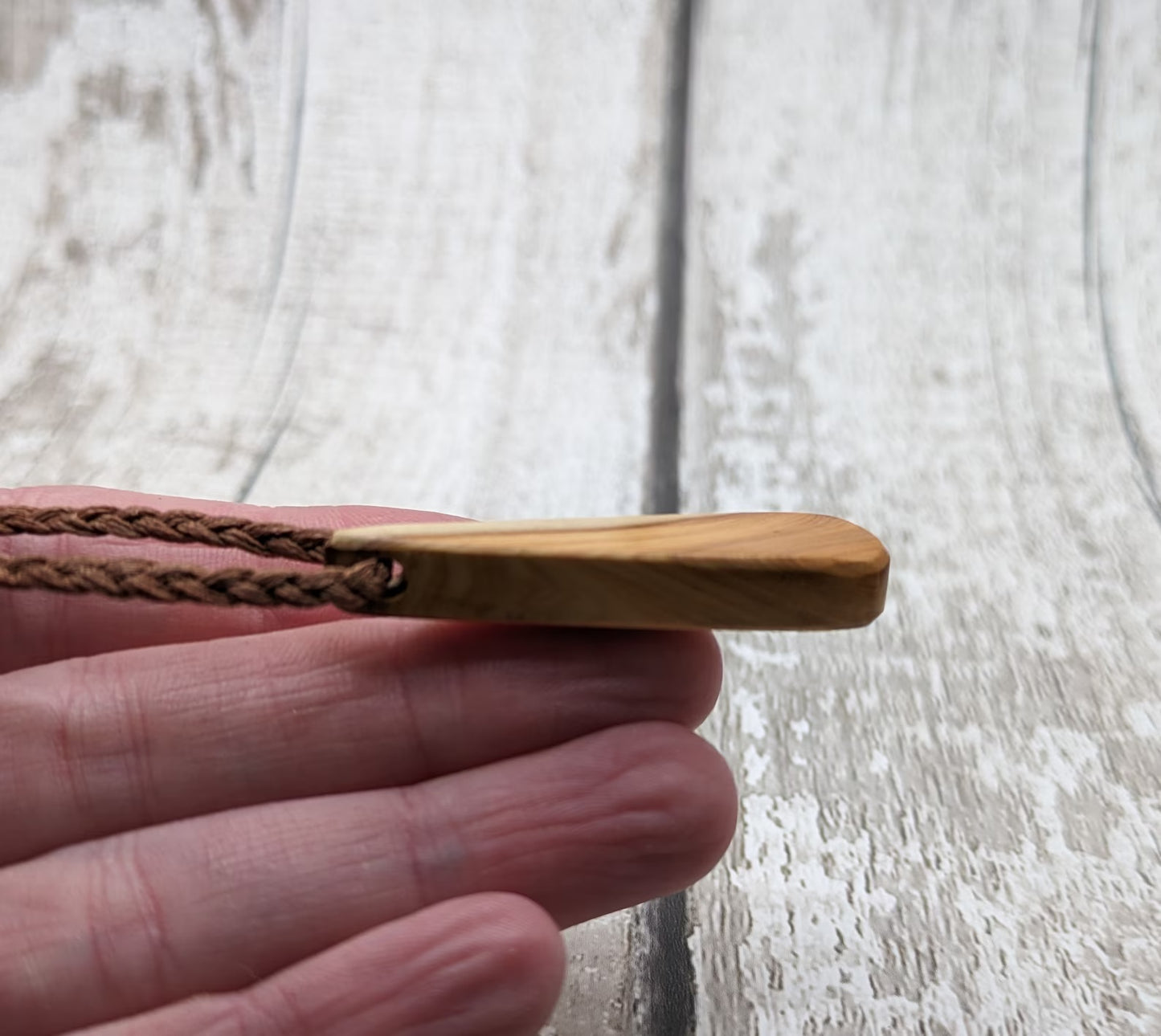 Yew wood roimata drop pendant.