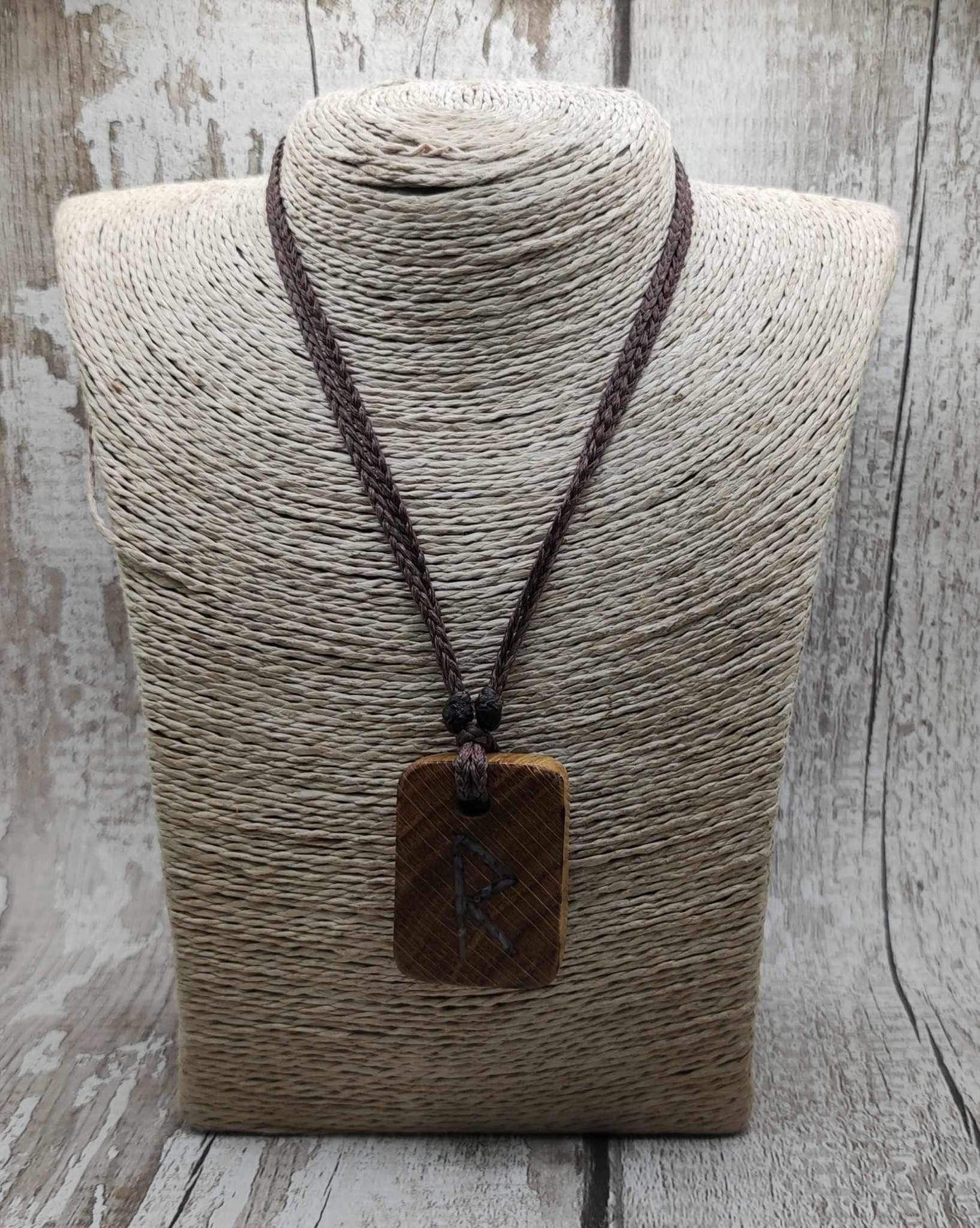 Raidho oak wood rune pendant with mussel shell inlay.