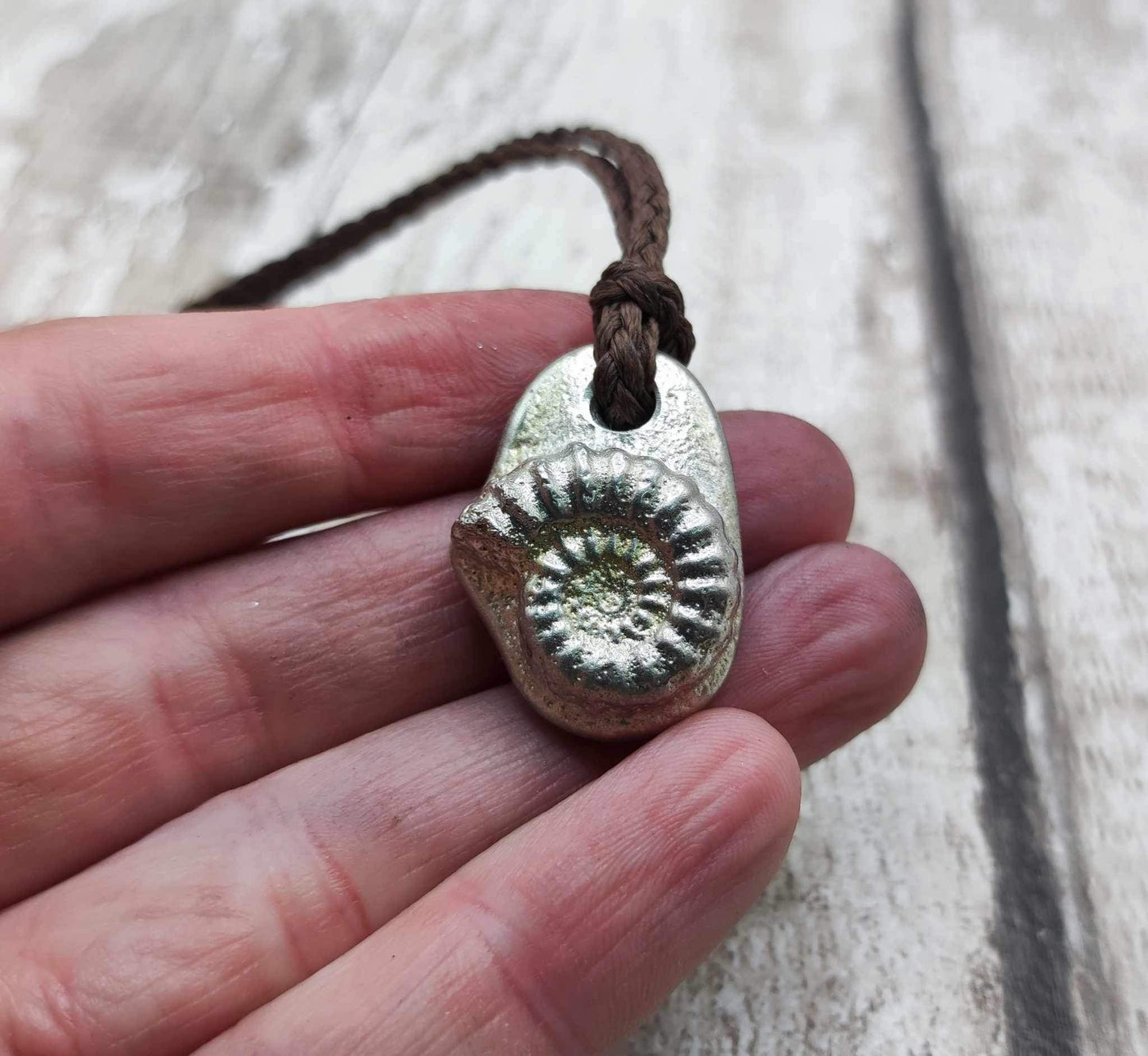 Pewter solid cast ammonite pendant.