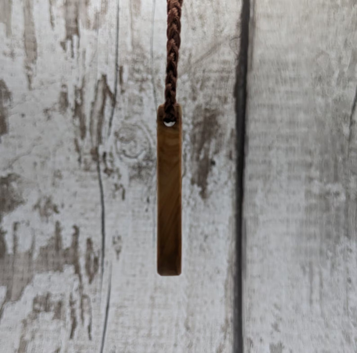 Yew wood roimata drop pendant.
