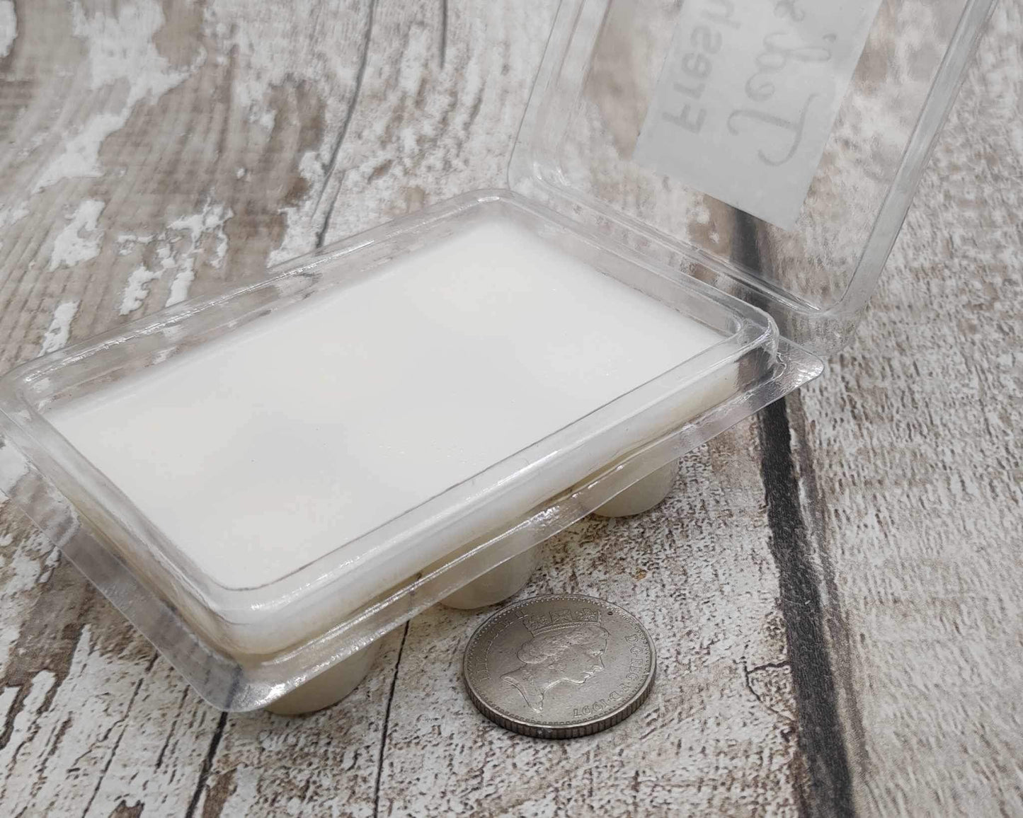 Orange and coconut, coconut wax melt.