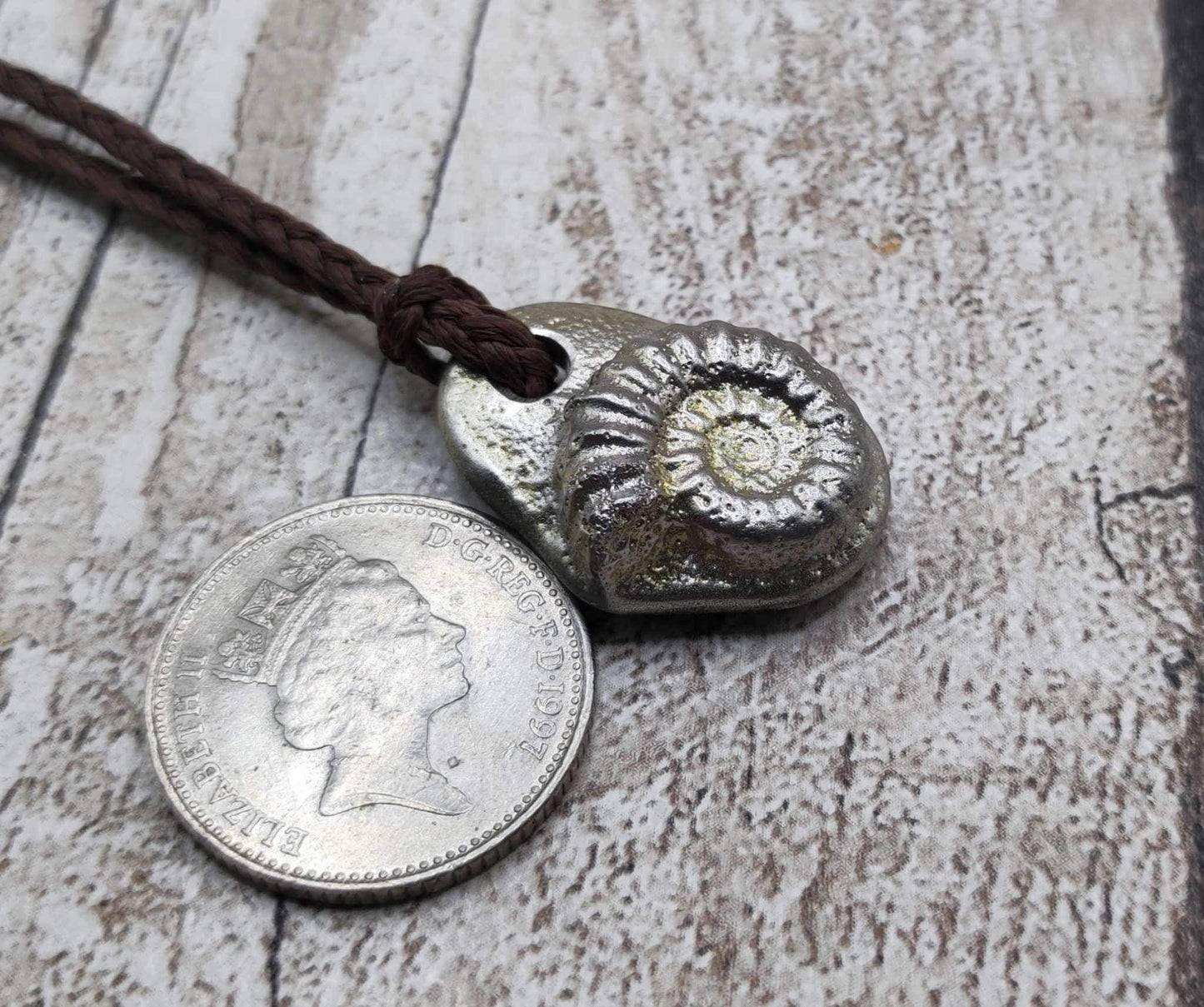 Pewter solid cast ammonite pendant.