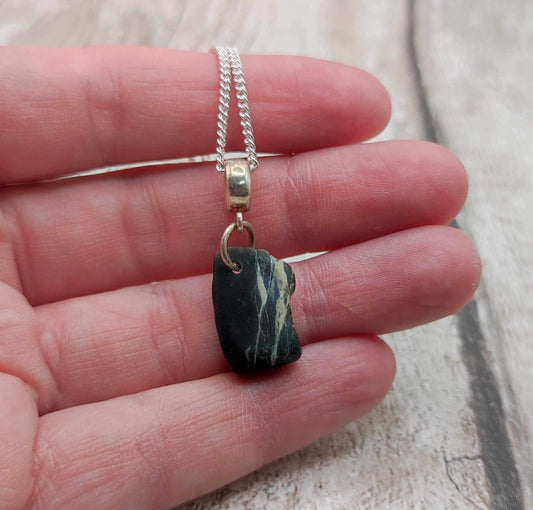 New Zealand Pounamu serpentine chip on silver pendant.