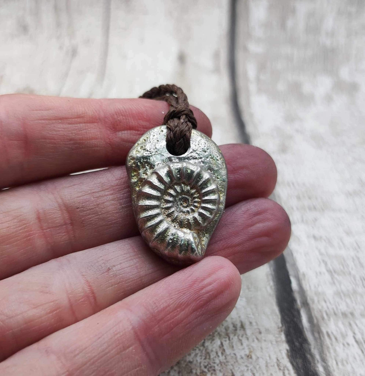 Pewter ammonite solid cast pendant.