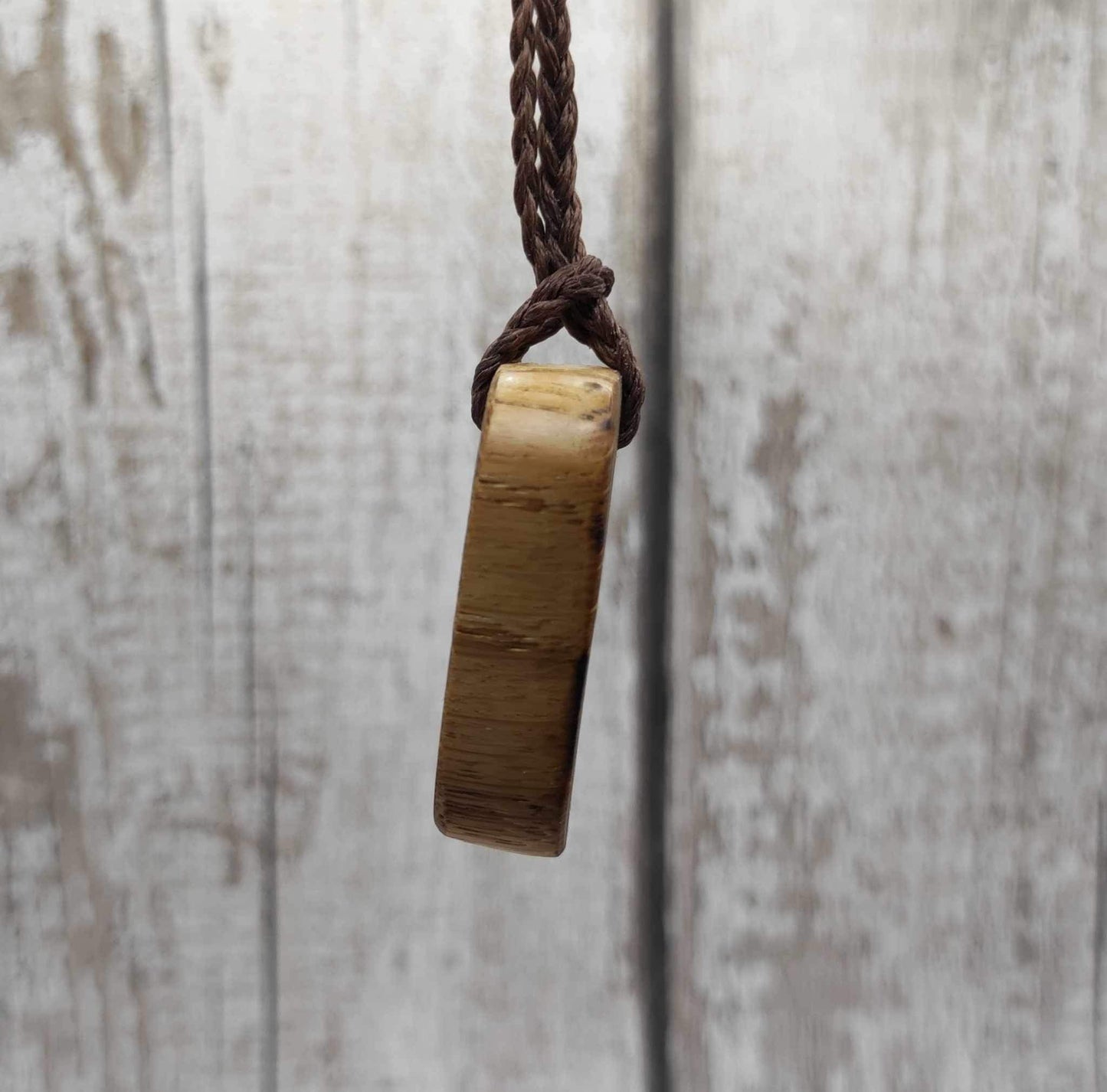 Oak wood jera Viking rune Christmas decoration with Pāua shell.
