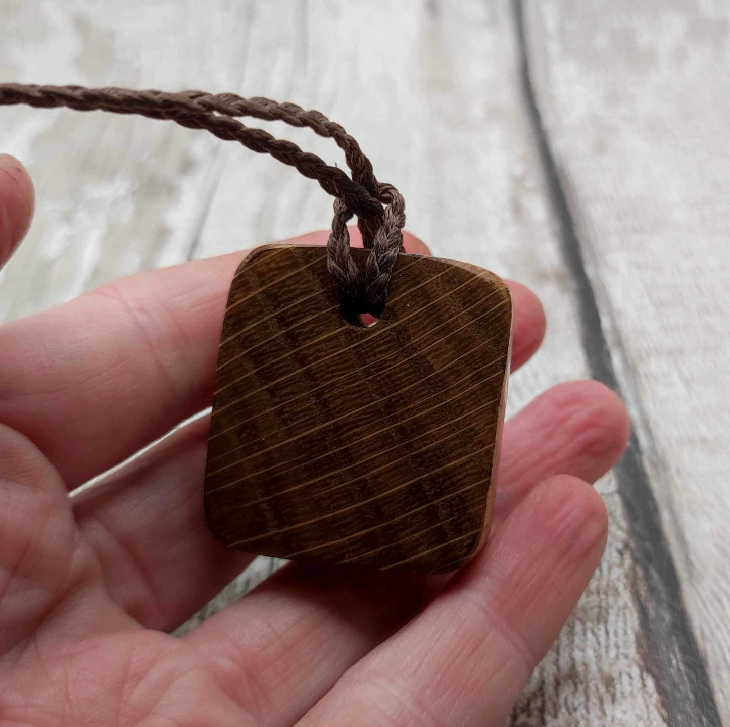 Perthro oak wood rune Christmas decoration with Pāua shell inlay.