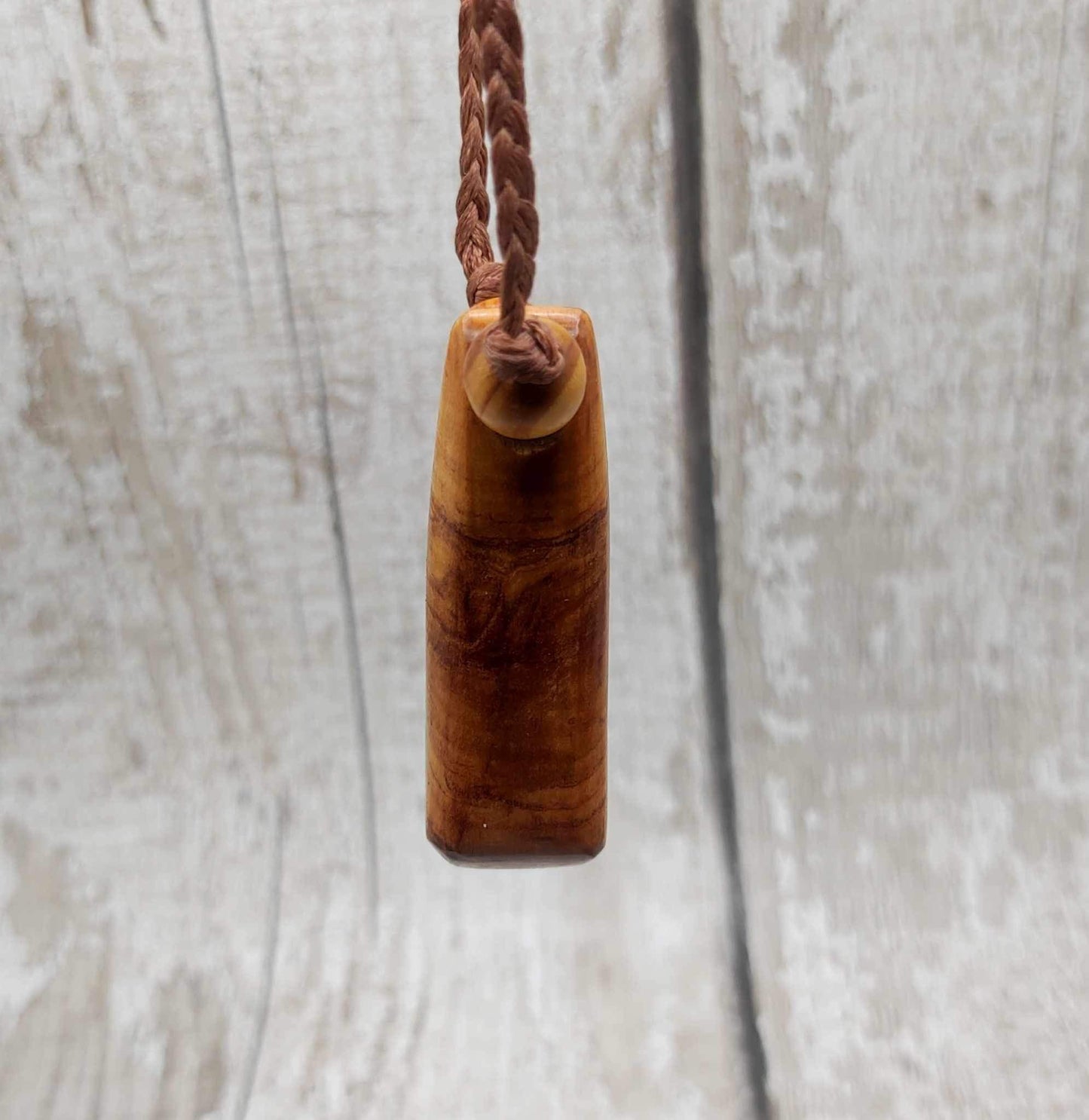 New Zealand Rimu wood and kauri copal gum pendant