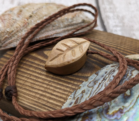 Maple wood leaf carved unisex pendant.