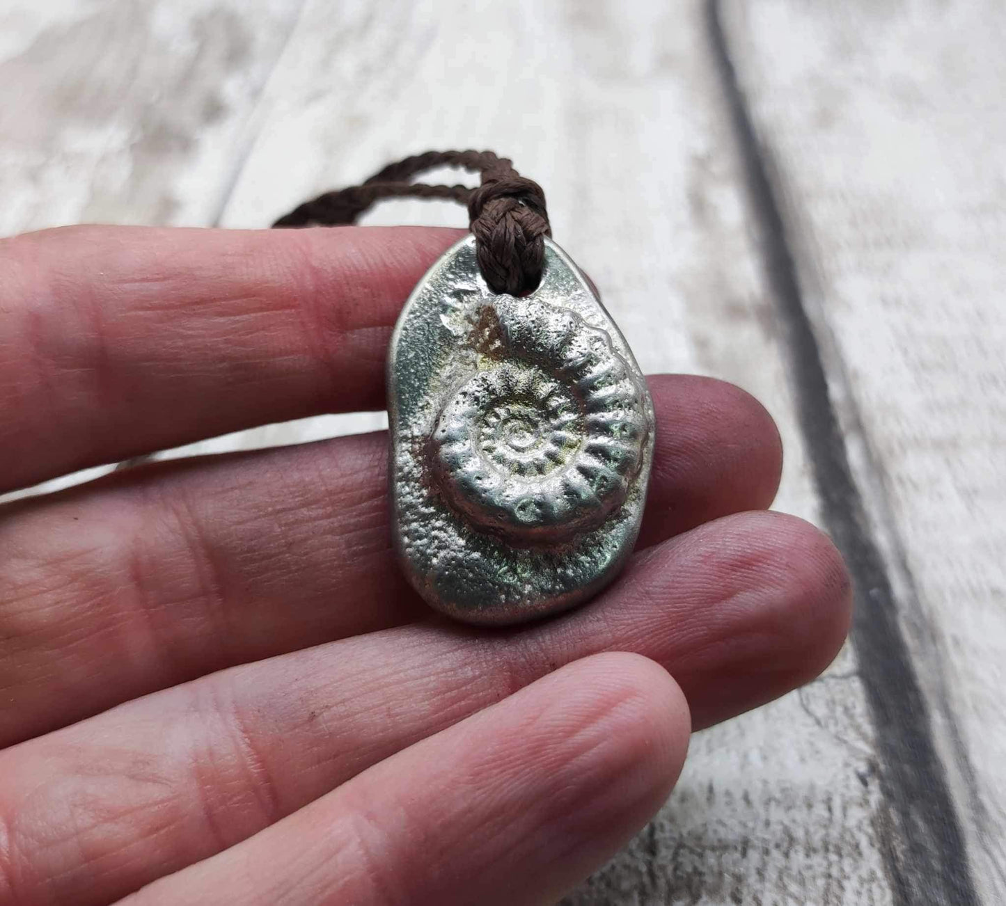 Pewter solid metal casting ammonite pendant.