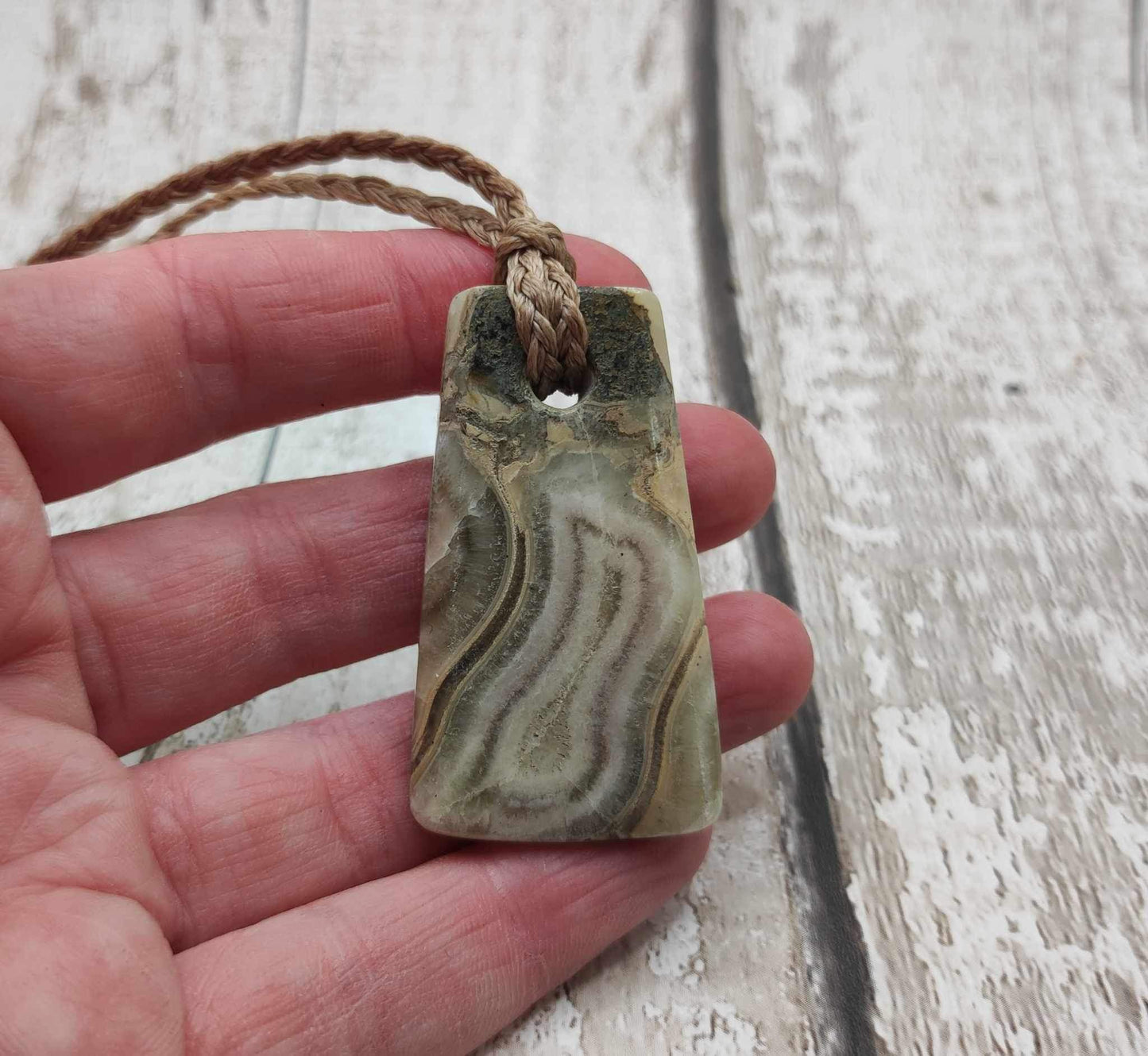 Ammonite chamber, calcite filled Toki style pendant.