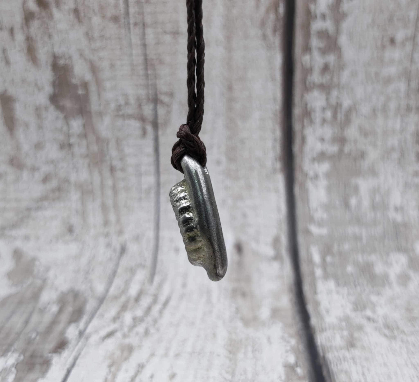 Pewter solid metal casting ammonite pendant.