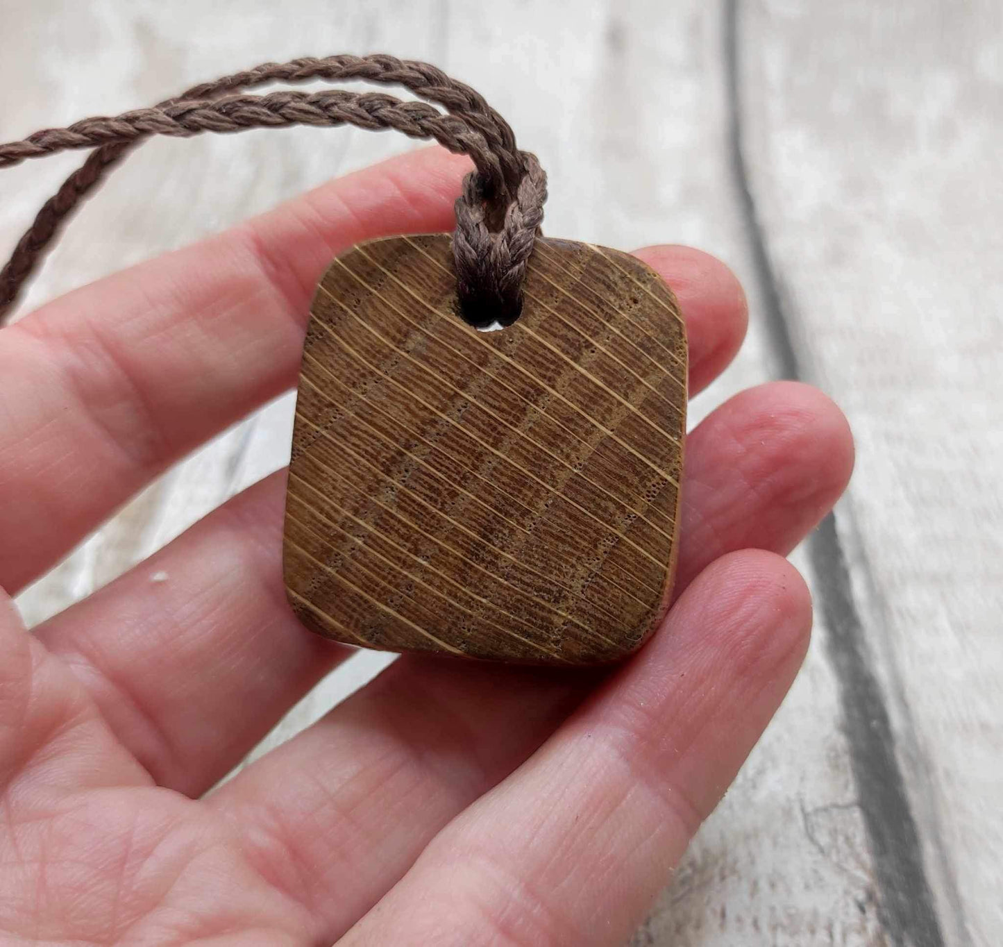 Oak wood jera Viking rune Christmas decoration with Pāua shell.