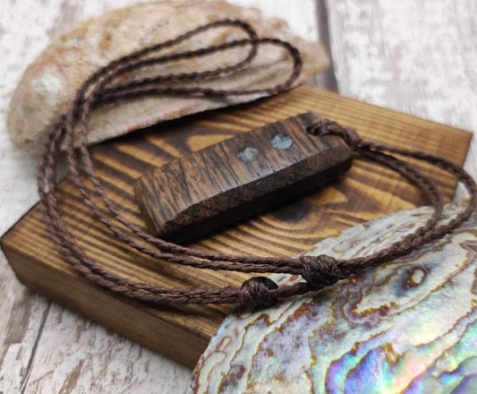 Bog preserved oak Hei Toki adze pendant with kanite inlay.