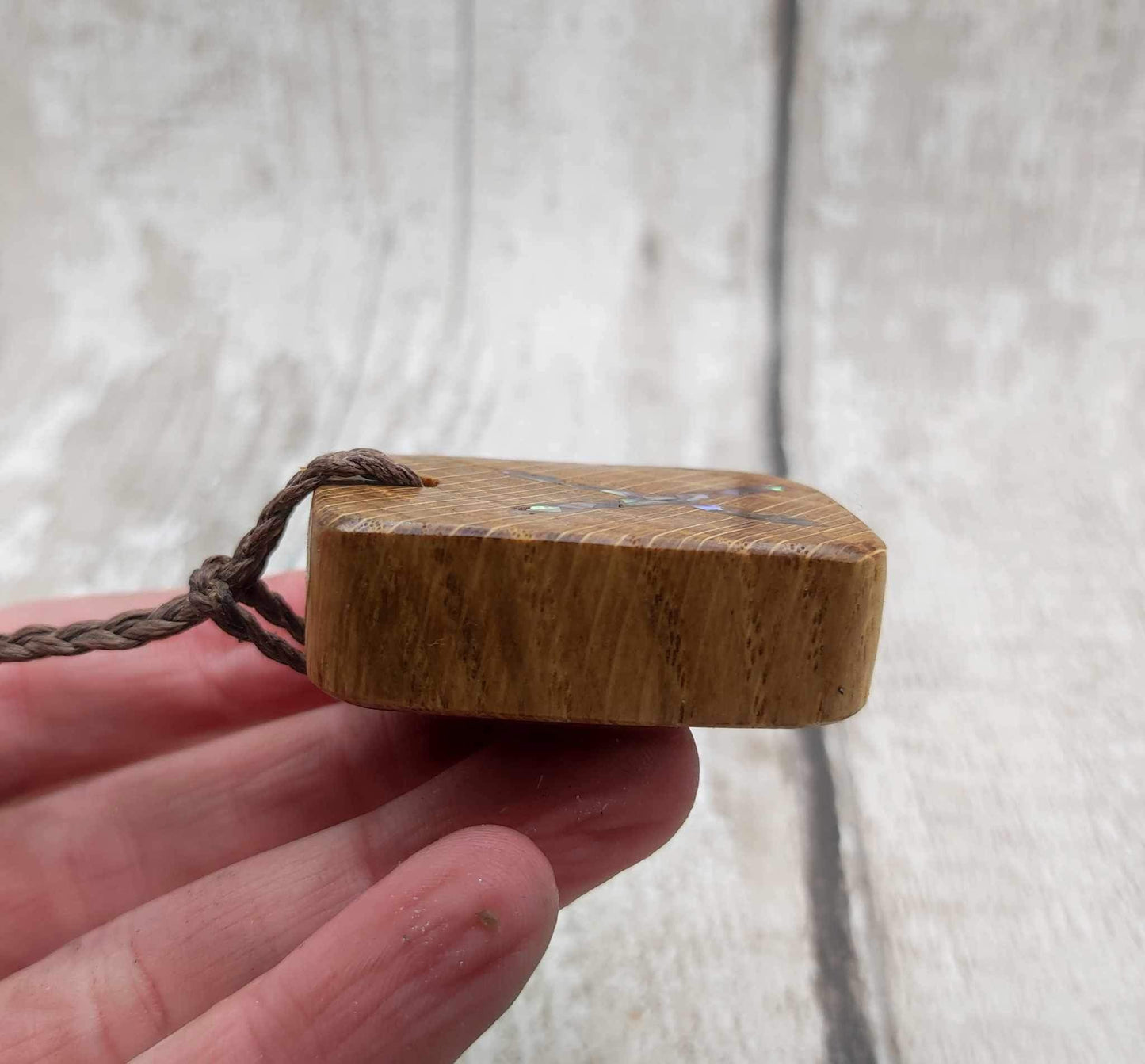 Oak wood gebo rune Christmas decoration with Pāua shell.