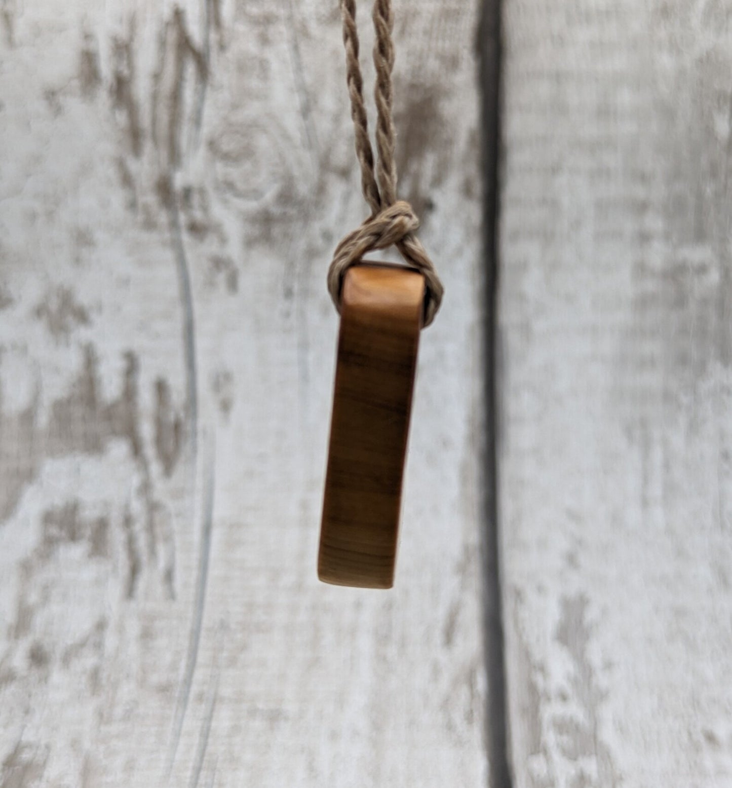 Yew wood square wood slice pendant.