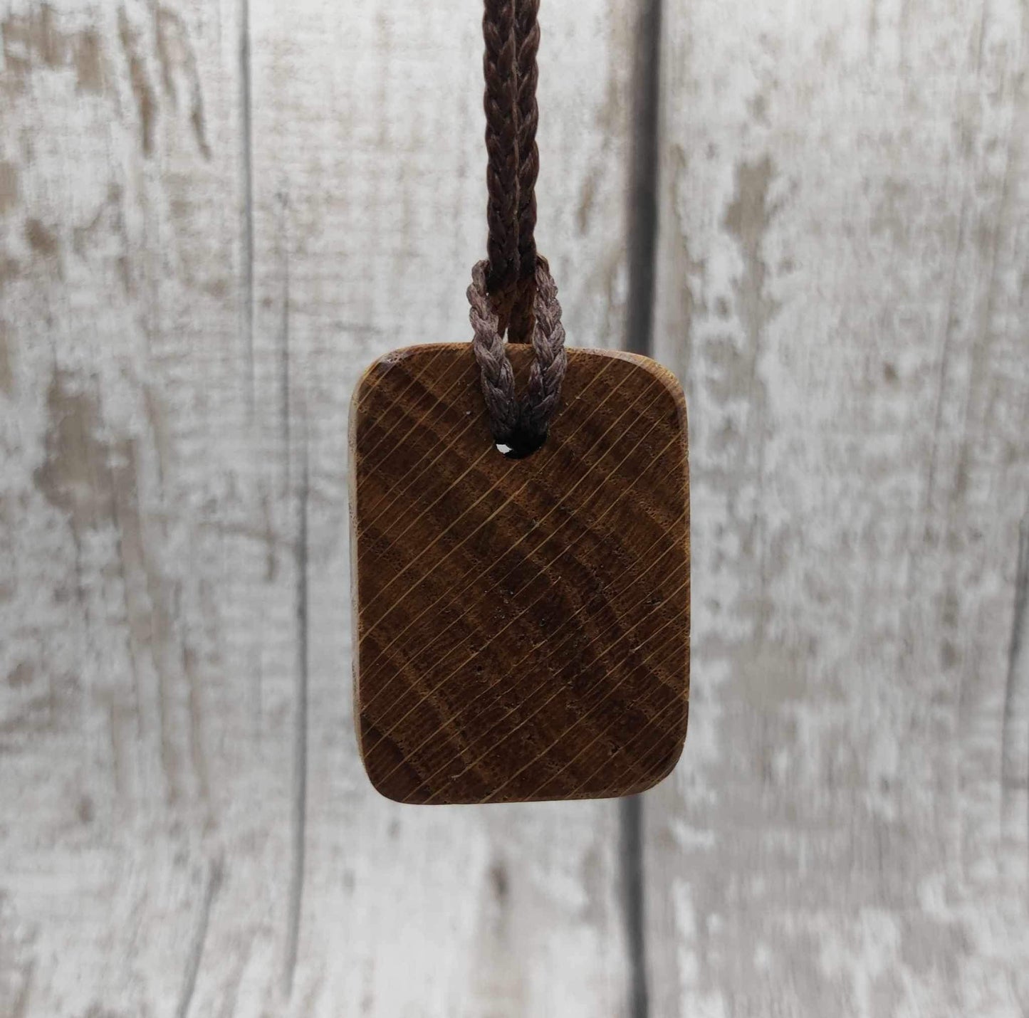 Oak wood gebo rune Christmas decoration with Pāua shell.