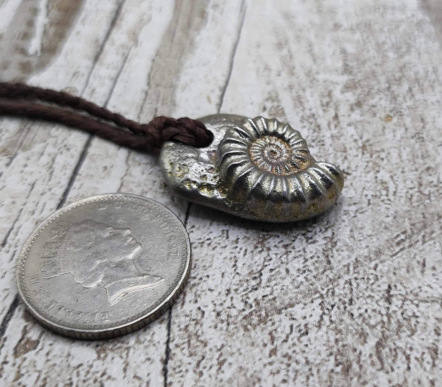 Pewter ammonite solid cast pendant.