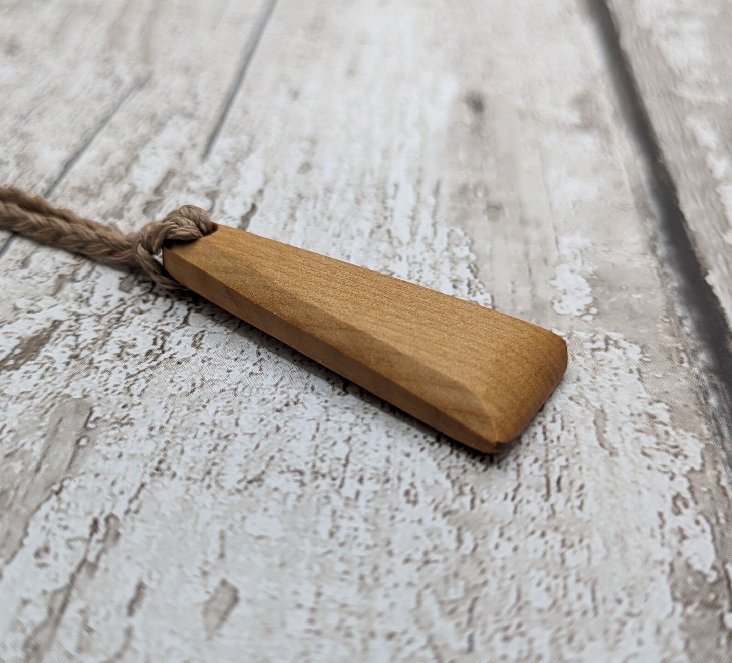 New Zealand Rimu wood Toki styled pendant.