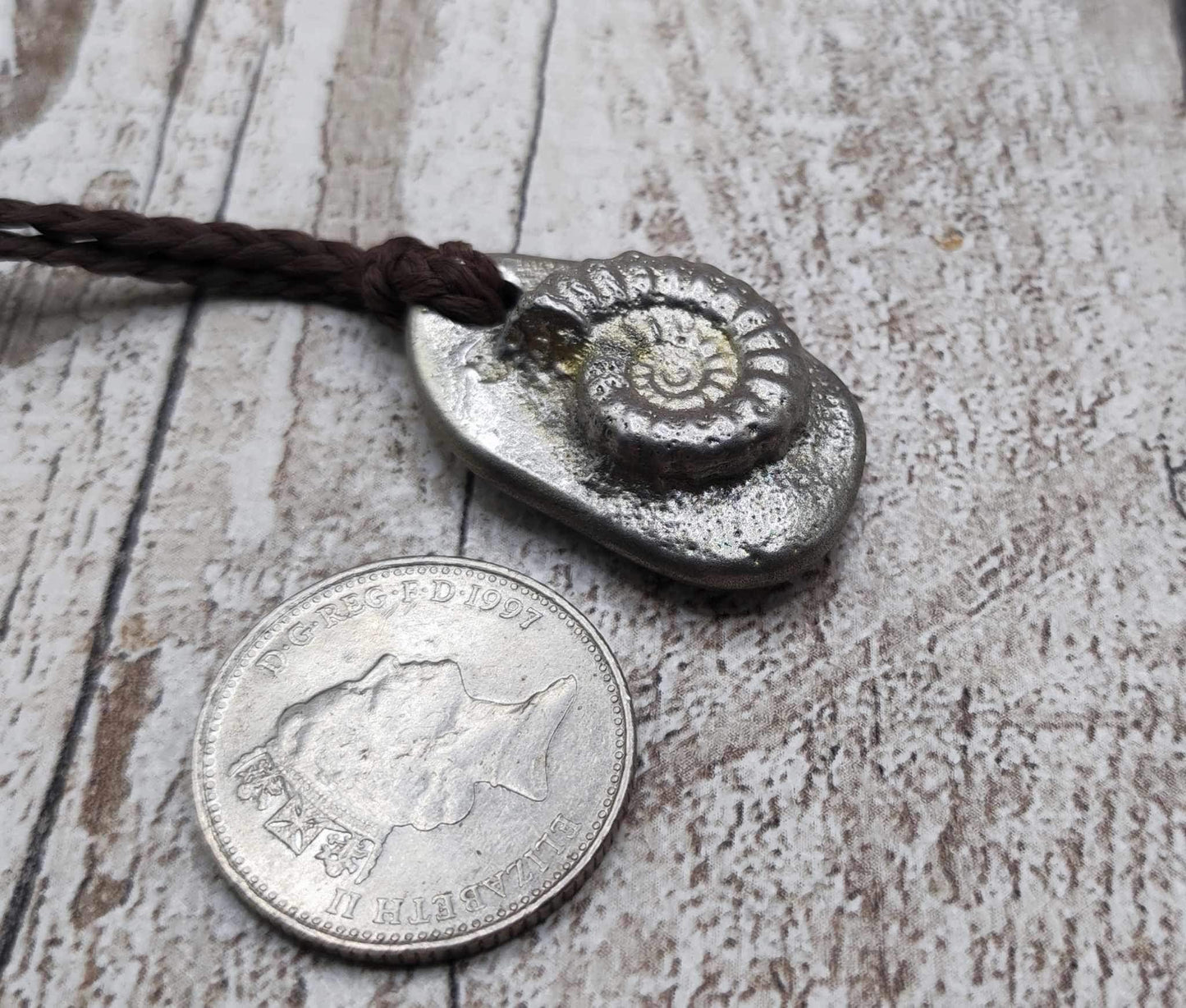 Pewter solid metal casting ammonite pendant.