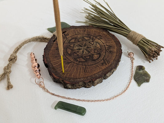 Oak wood slice geometric pattern laser printed pendulum board.