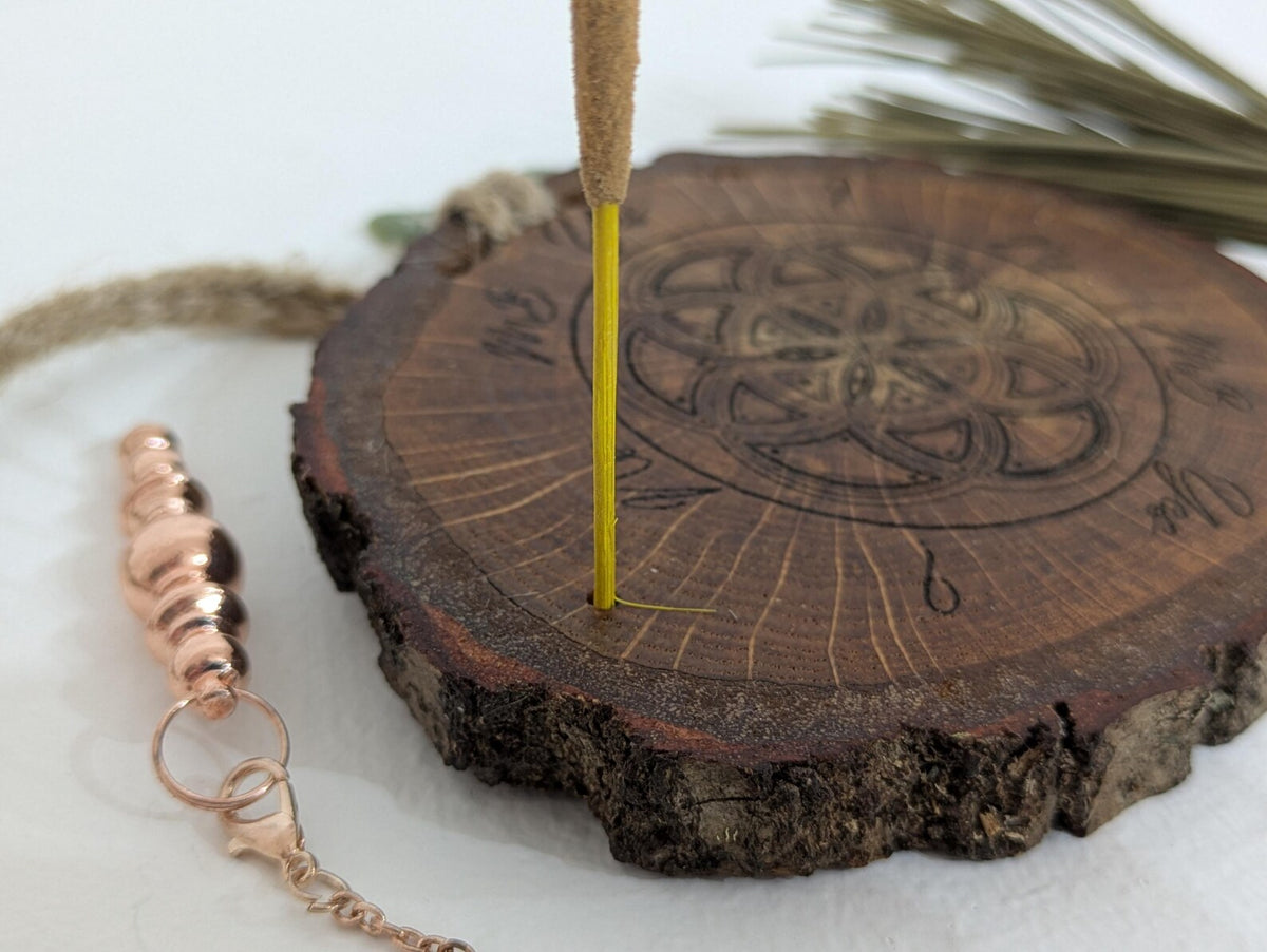 Oak wood slice geometric pattern laser printed pendulum board.