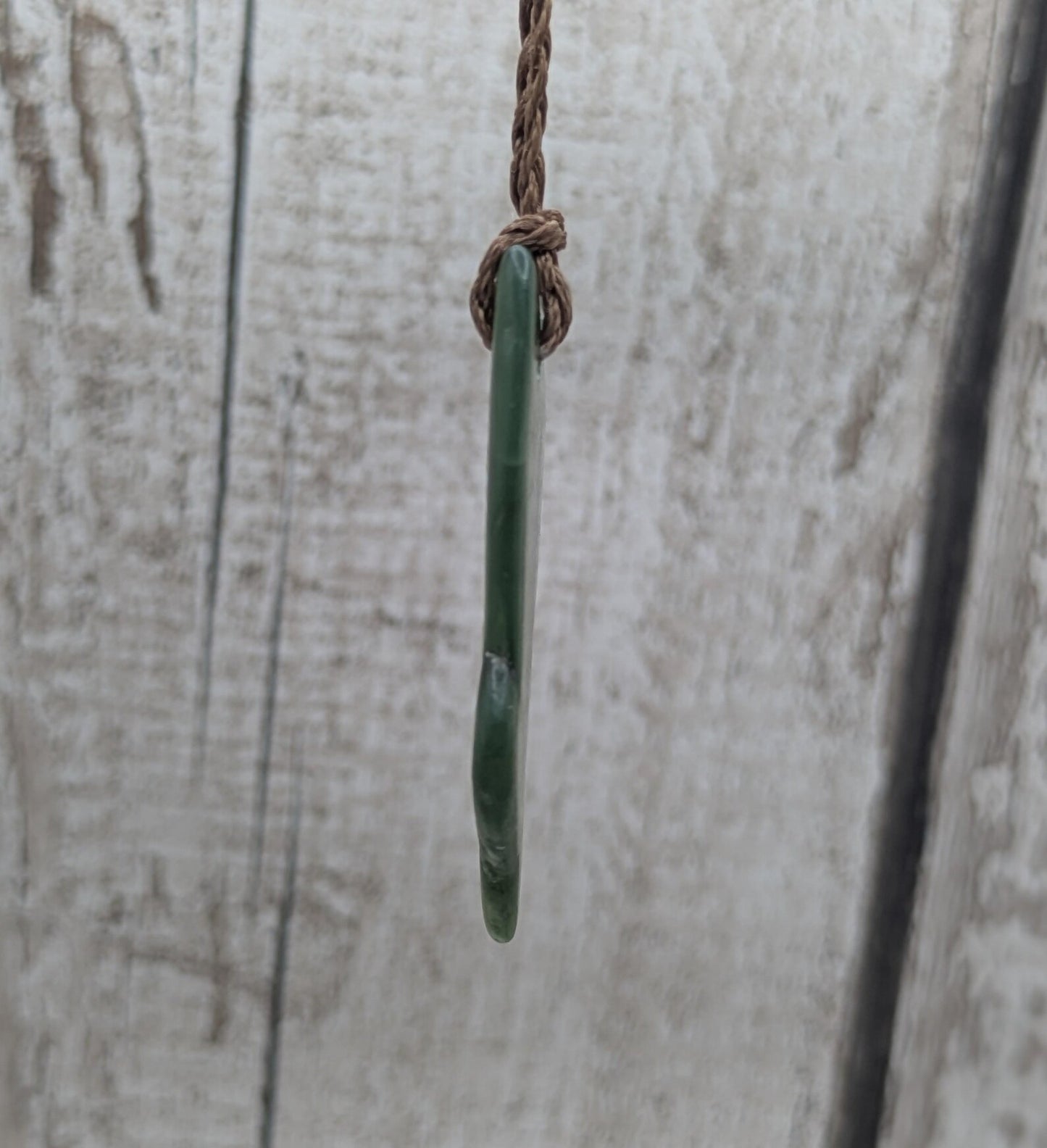 nz tumbled pounamu greenstone jade pendant.