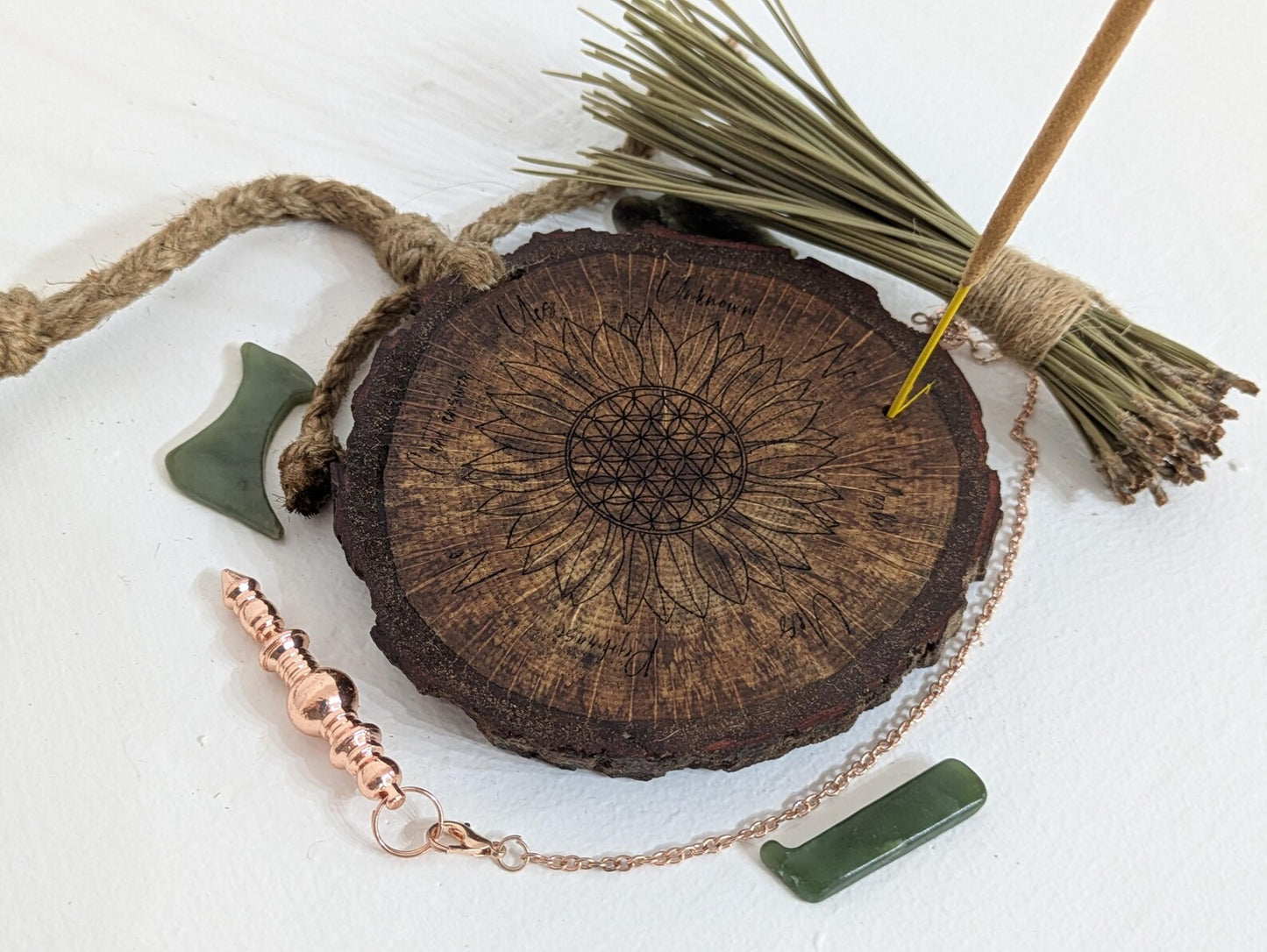 Oak wood slice with sunflower and flower of life laser printed pendulum board.