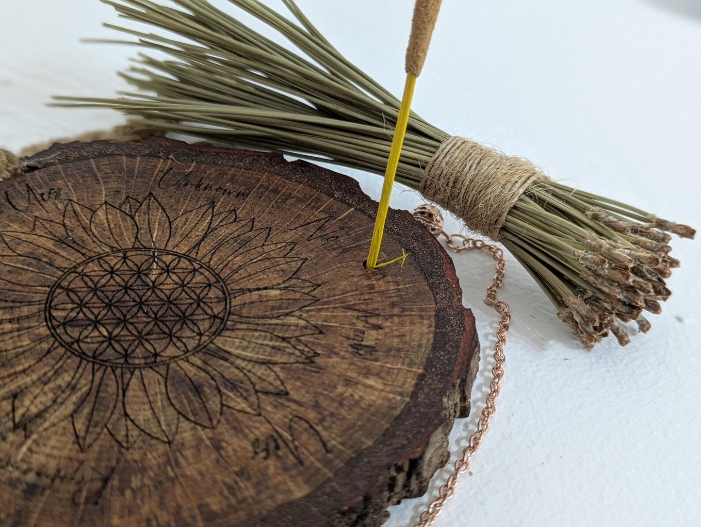 Oak wood slice with sunflower and flower of life laser printed pendulum board.