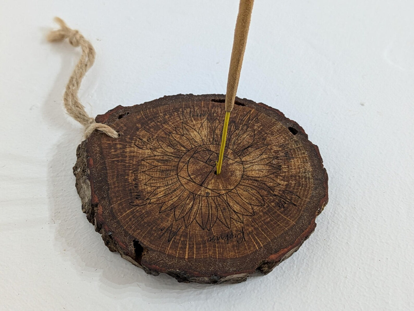 Oak wood slice sunflower and Fibonacci sequence print pendulum board.