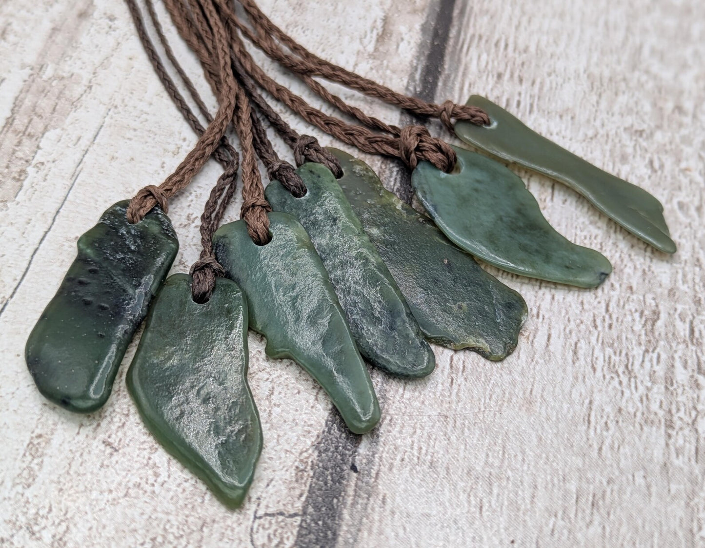 One random Pounamu nephrite jade pendant.