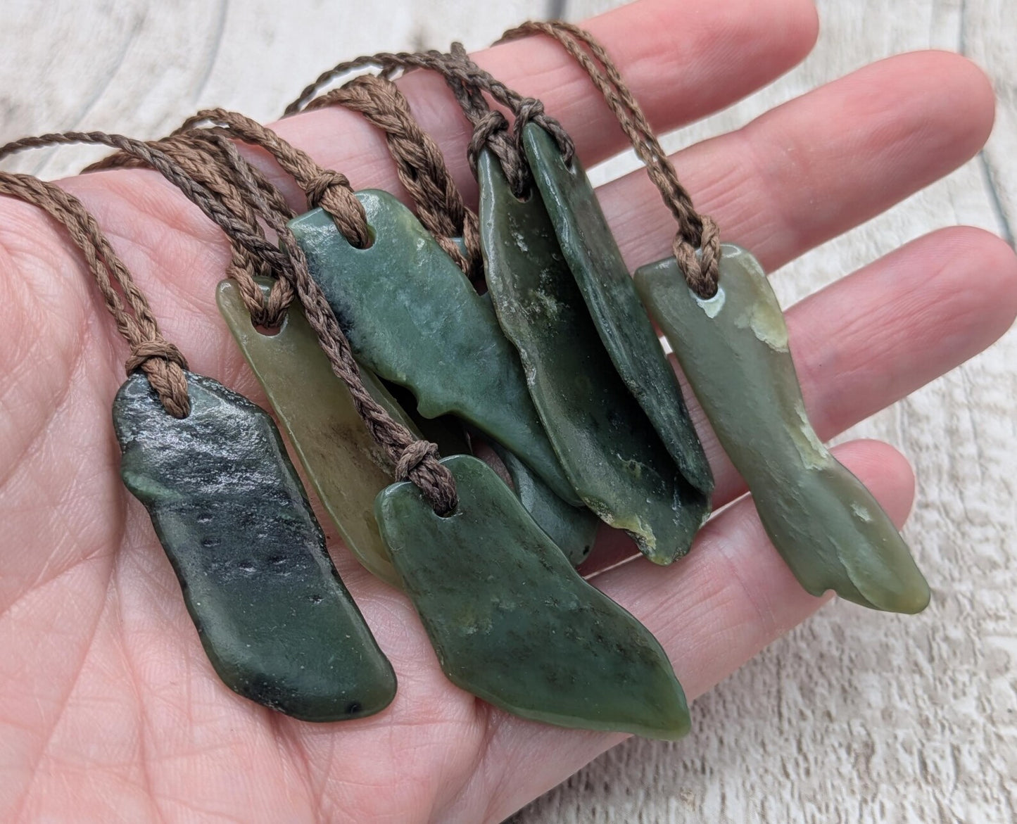 One random Pounamu nephrite jade pendant.