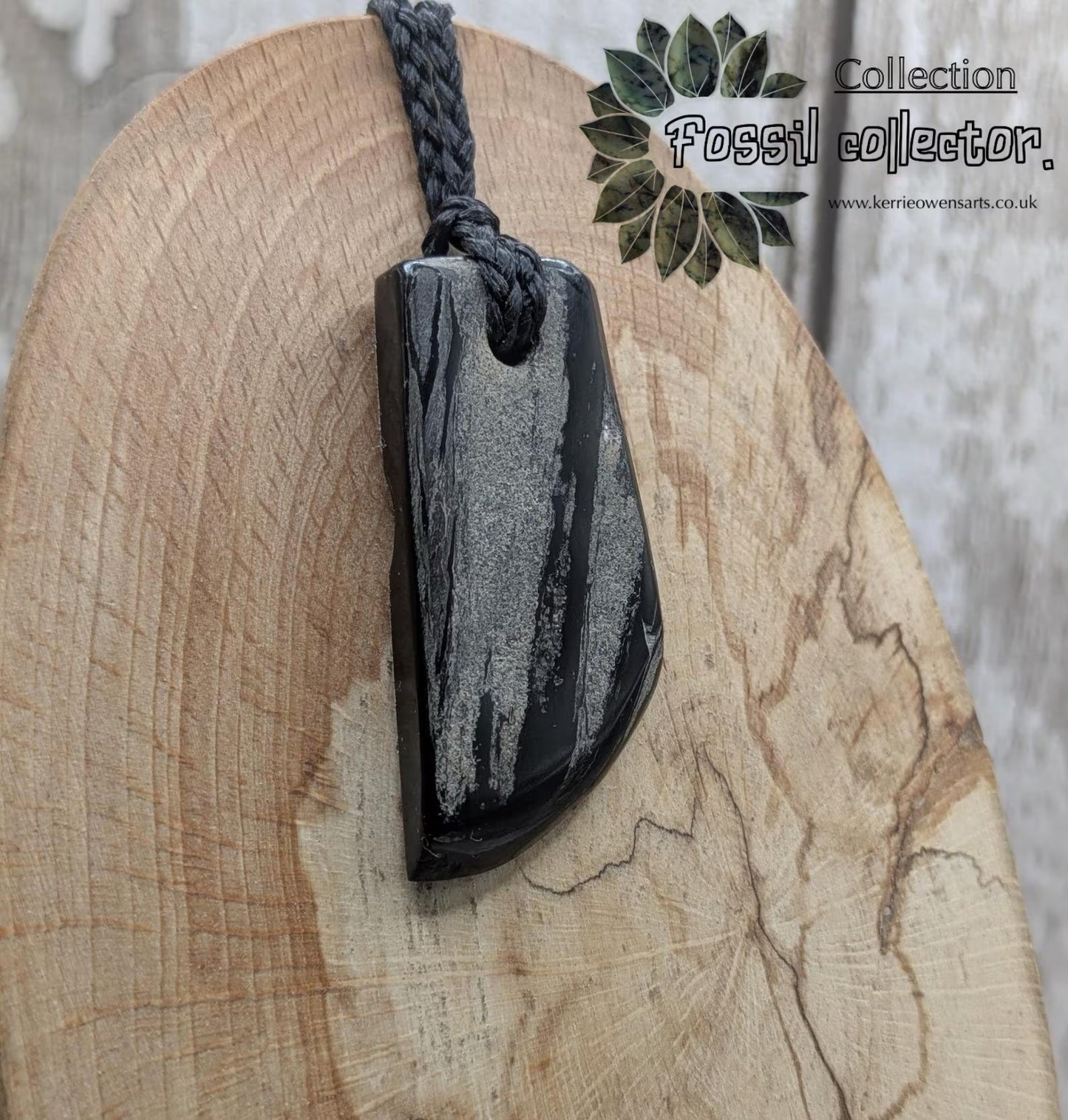 Whitby jet mixed textured polished pendant.