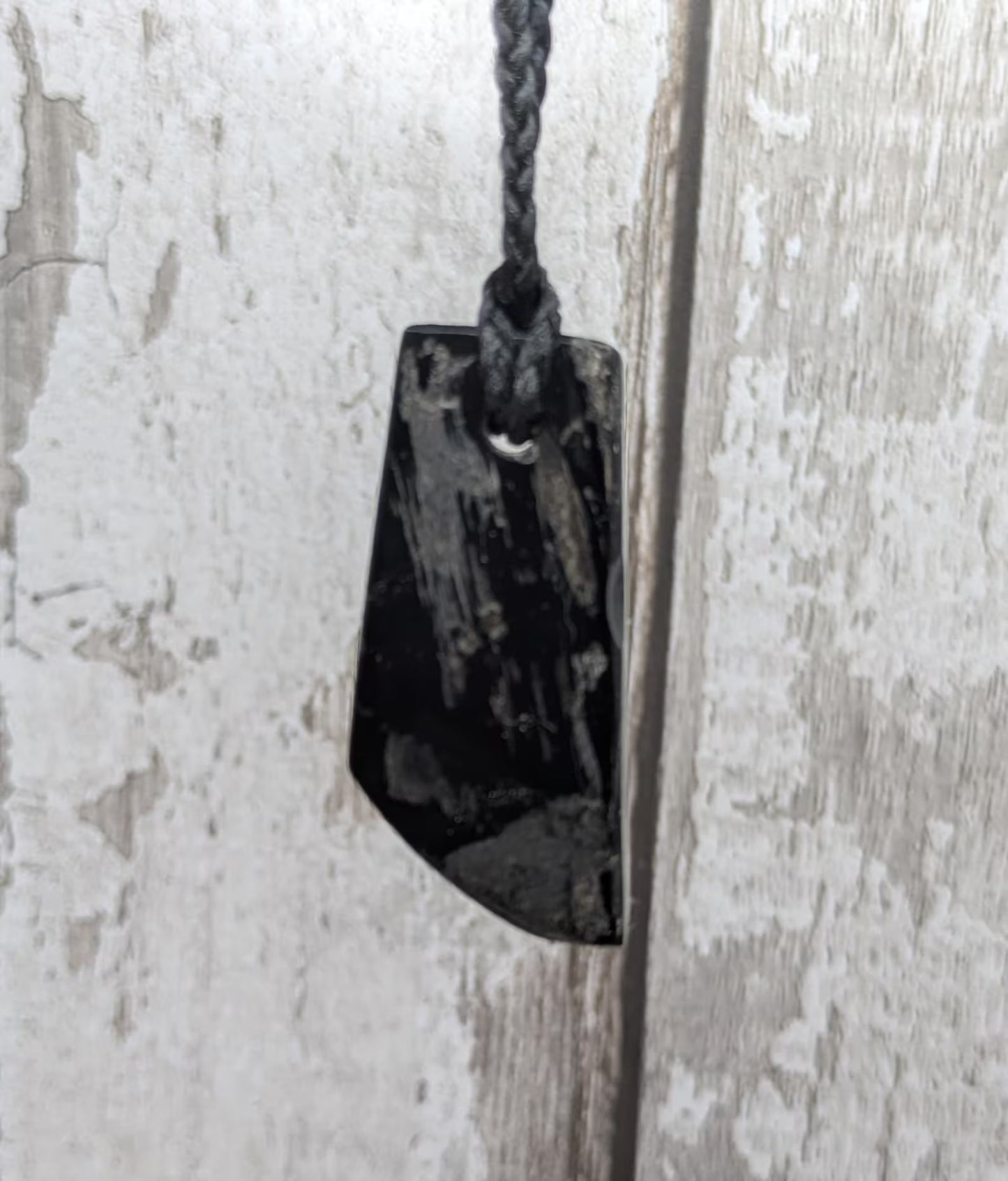 Whitby jet mixed textured polished pendant.